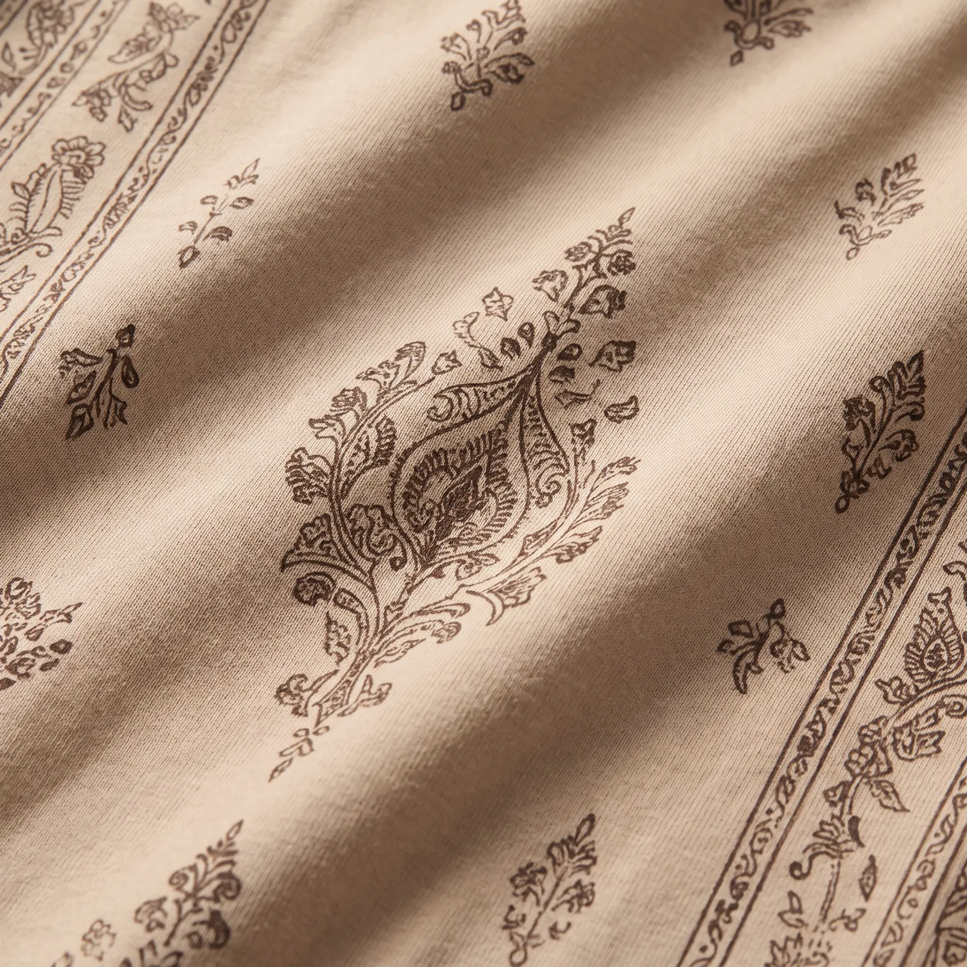 Close textile detail of the Nila botanical print
